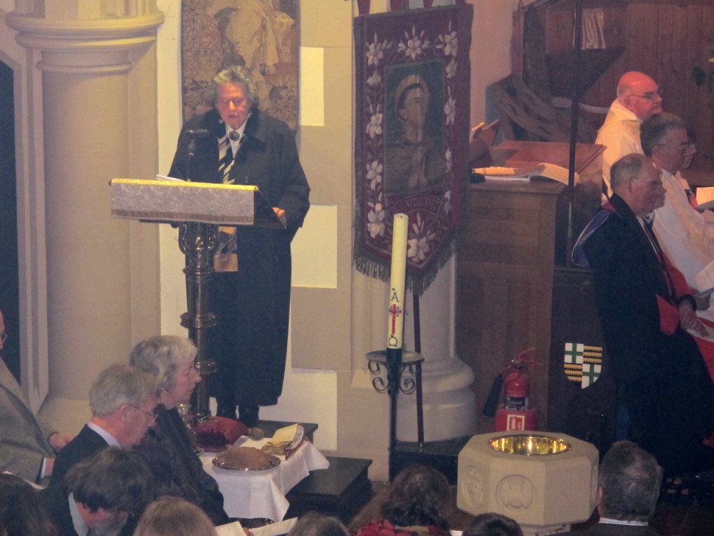 Susan Paul reads the Epistle during the Institution Eucharist of Canon Allan Maclean as Rector of St Vincent's on St Vincent's Day, 22 January 2015
